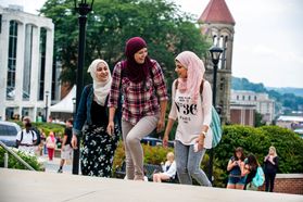 Group of women walking on campus