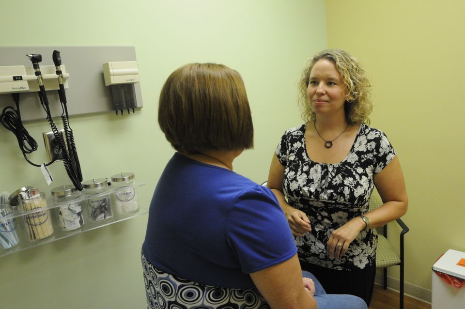 Patient consults with doctor