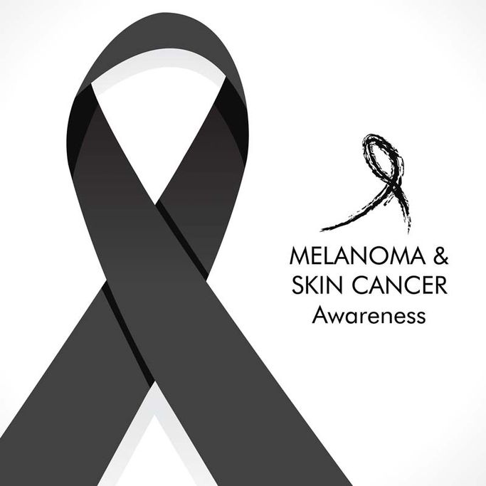 black ribbon with skin cancer awareness