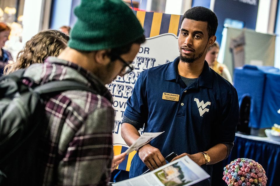 WVU employee talking to student